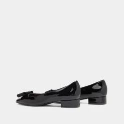 Ballerines avec noeud et monogramme