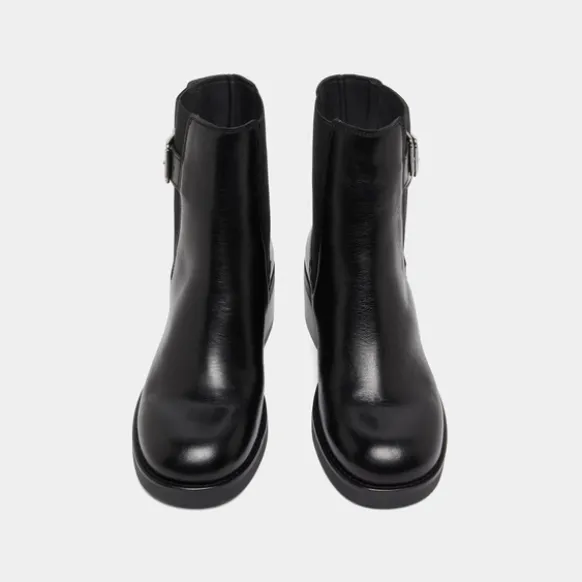 Boots à élastiques et boucles ajustables...