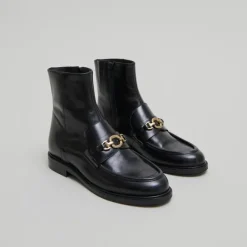 Boots à mors dorés