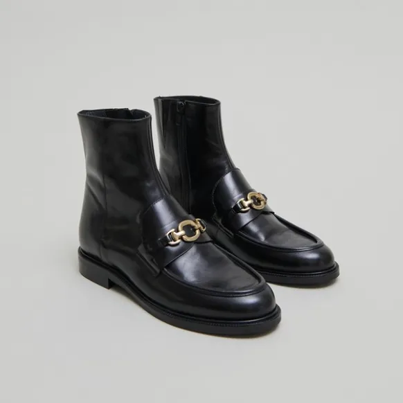 Boots à mors dorés