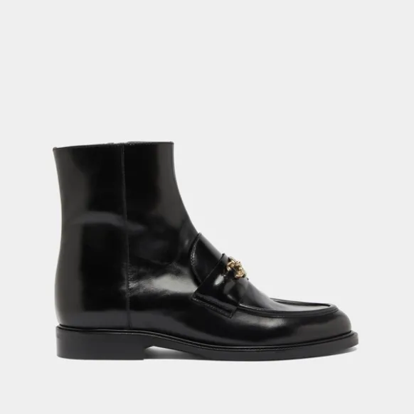Boots à mors dorés
