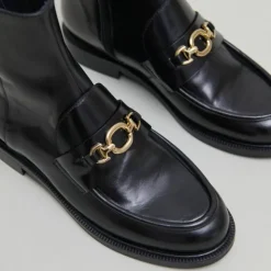 Boots à mors dorés