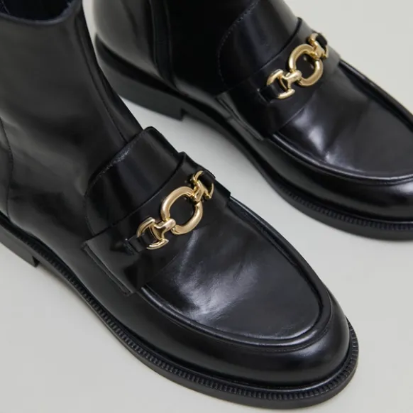 Boots à mors dorés
