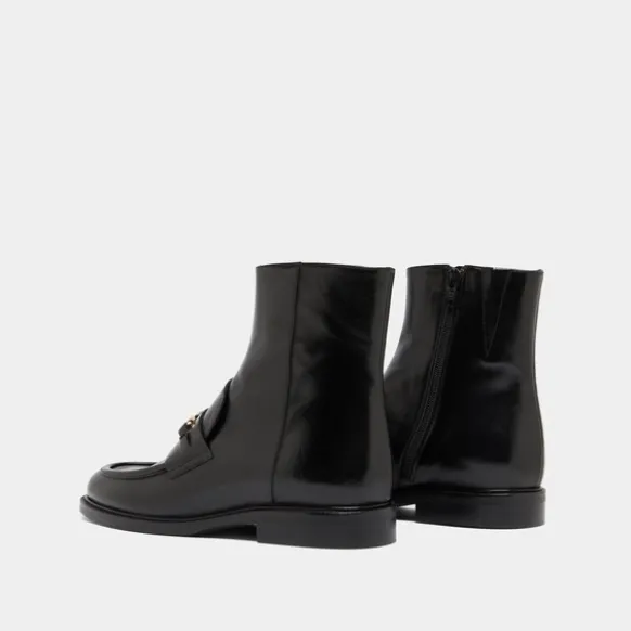 Boots à mors dorés