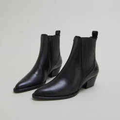 Boots à petits talons biseautés et élast...