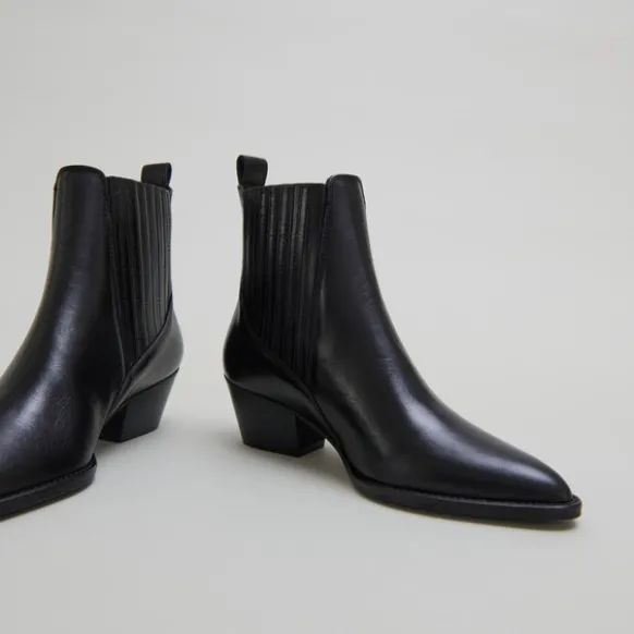 Boots à petits talons biseautés et élast...