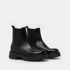 Boots à semelles crantées et élastiques
