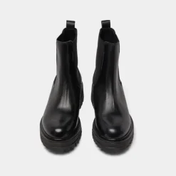Boots à semelles crantées et élastiques