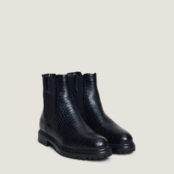 Boots à semelles crantées et élastiques