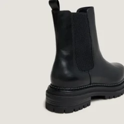 Boots à semelles crantées et élastiqu...