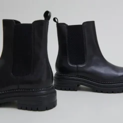 Boots à semelles crantées et élastiqu...