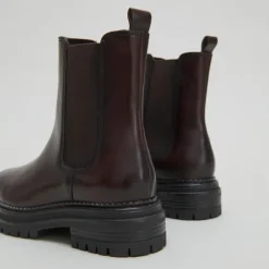Boots à semelles crantées et élastiqu...