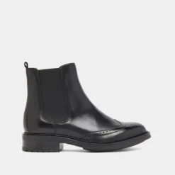Boots basses à élastiques et détails ajourés