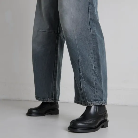 Boots basses à élastiques et détails ajourés