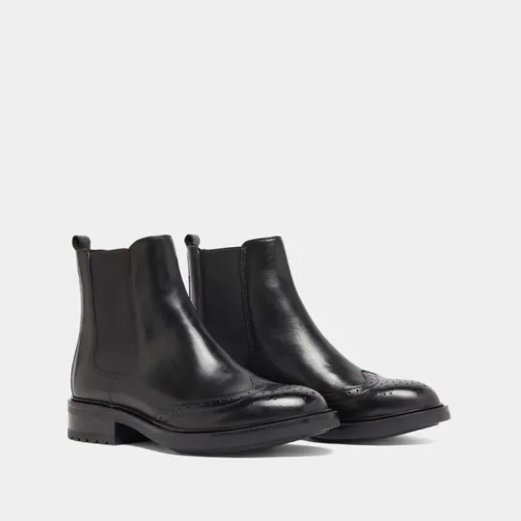 Boots basses à élastiques et détails ajourés