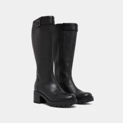 Bottes à semelles crantées et boucles