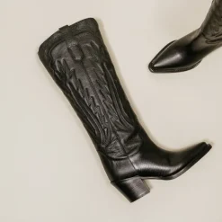 Bottes à talons épais et surpiqures apparentes