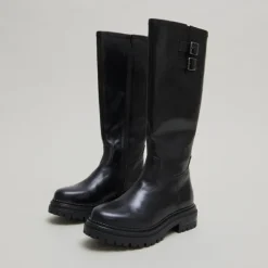 Bottes hautes à semelles crantées et bou...