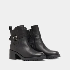 Bottines à bouts ronds et boucles