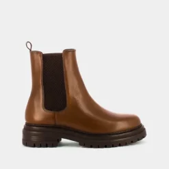 Bottines à semelles crantées et élastiques