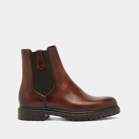 Bottines à semelles crantées et élastiques