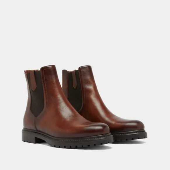 Bottines à semelles crantées et élastiques