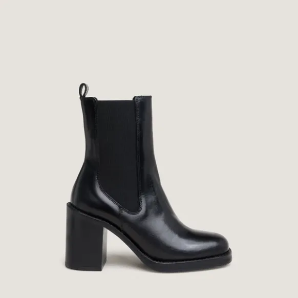 Bottines à talons débordants