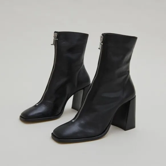 Bottines à talons et fermetures éclairs ...