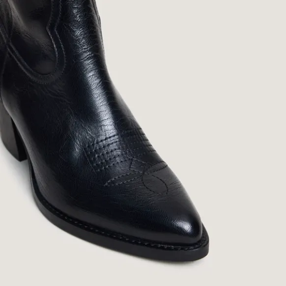 Bottines à talons et surpiqures apparentes