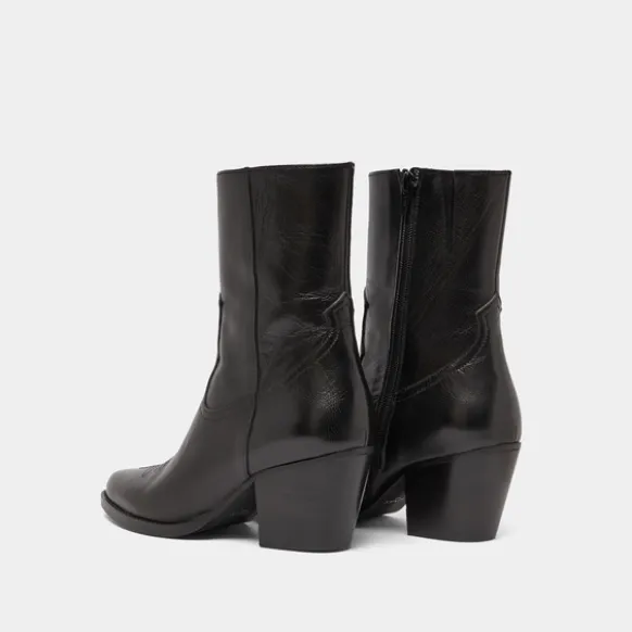 Bottines à talons et surpiqures apparentes