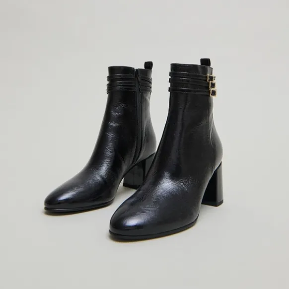 Bottines détaillées de boucles