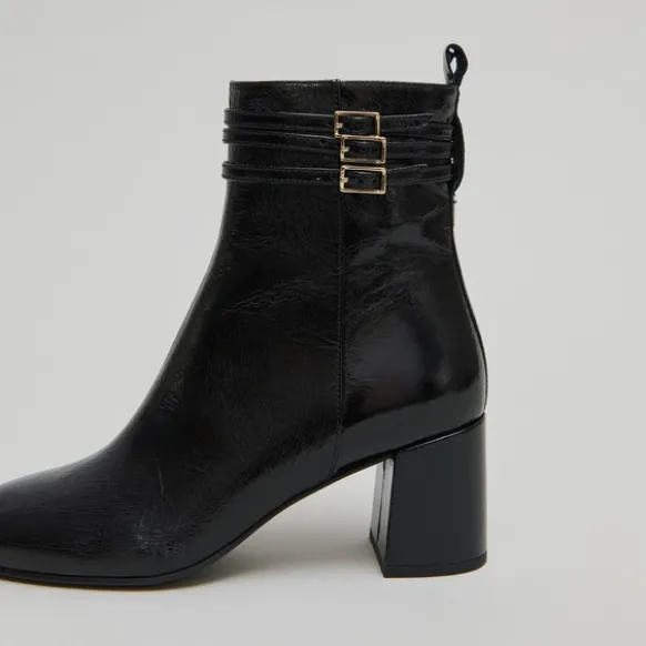 Bottines détaillées de boucles