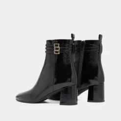 Bottines détaillées de boucles