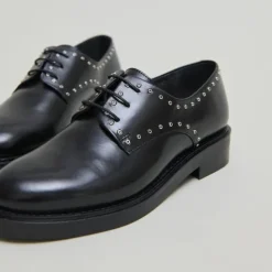 Derbies à détails argentés
