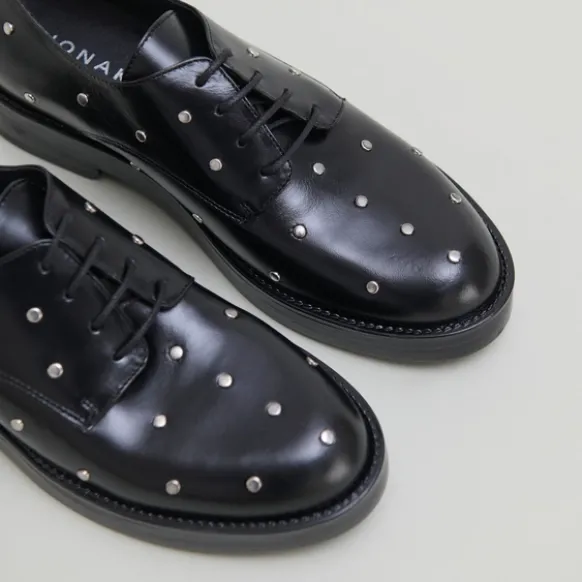 Derbies à détails argentés