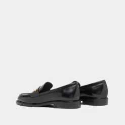 Mocassins à bouts ronds et monogrammes