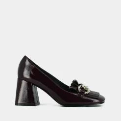 Mocassins à talons et boucles argentées...