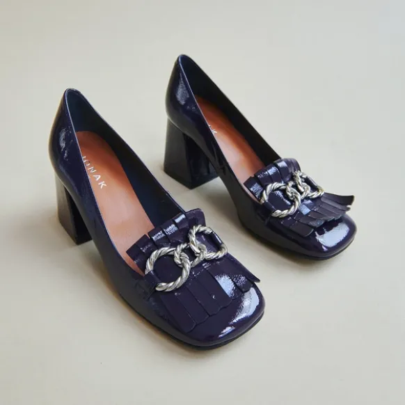 Mocassins à talons et boucles argentées...