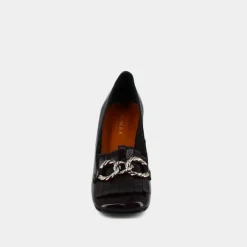 Mocassins à talons et boucles argentées...