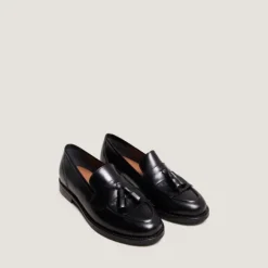 Mocassins à talons plats et pompons