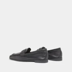 Mocassins à talons plats et bouts arrond...