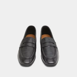 Mocassins à talons plats et bouts arrond...