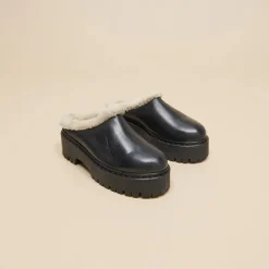 Mules à bouts ronds et semelles crantées...