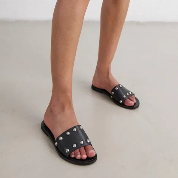Mules à détails argentés