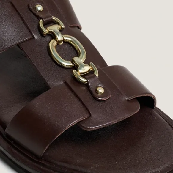 Mules à mors dorés