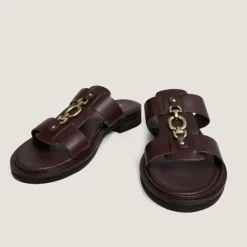 Mules à mors dorés