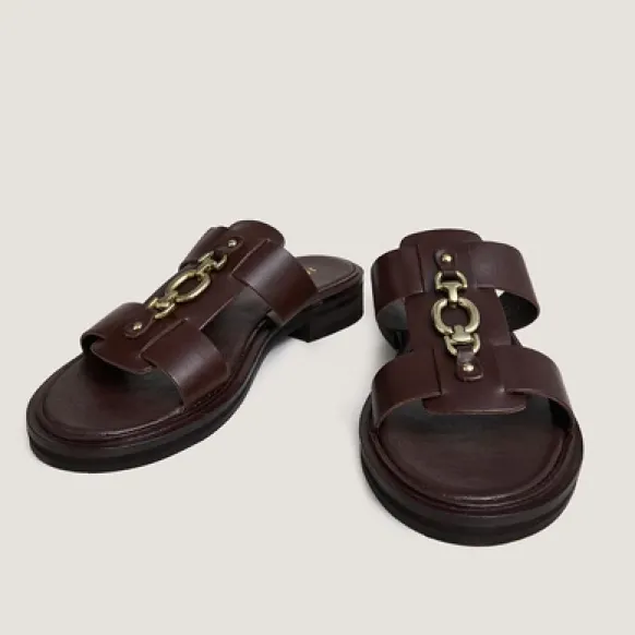 Mules à mors dorés