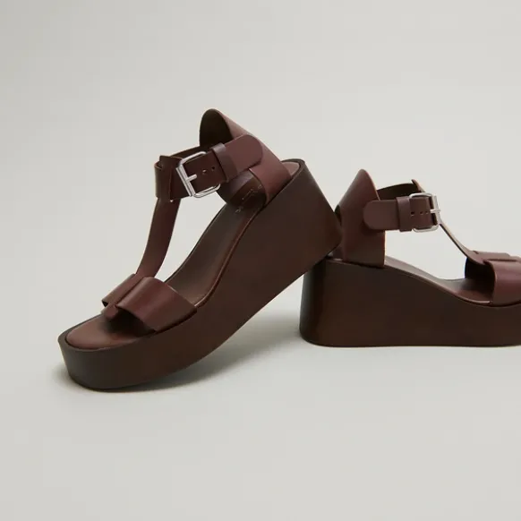 Sandales compensées à boucles ajustables